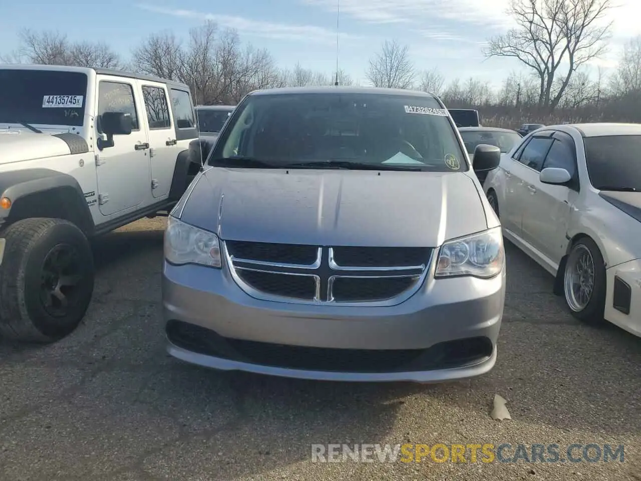 5 Photograph of a damaged car 2C4RDGBG8KR654591 DODGE CARAVAN 2019