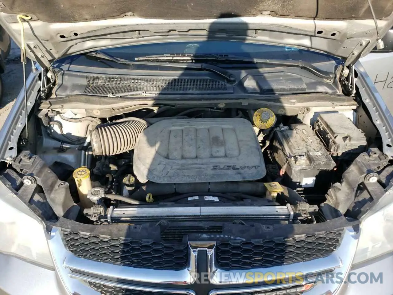 12 Photograph of a damaged car 2C4RDGBG9KR677815 DODGE CARAVAN 2019