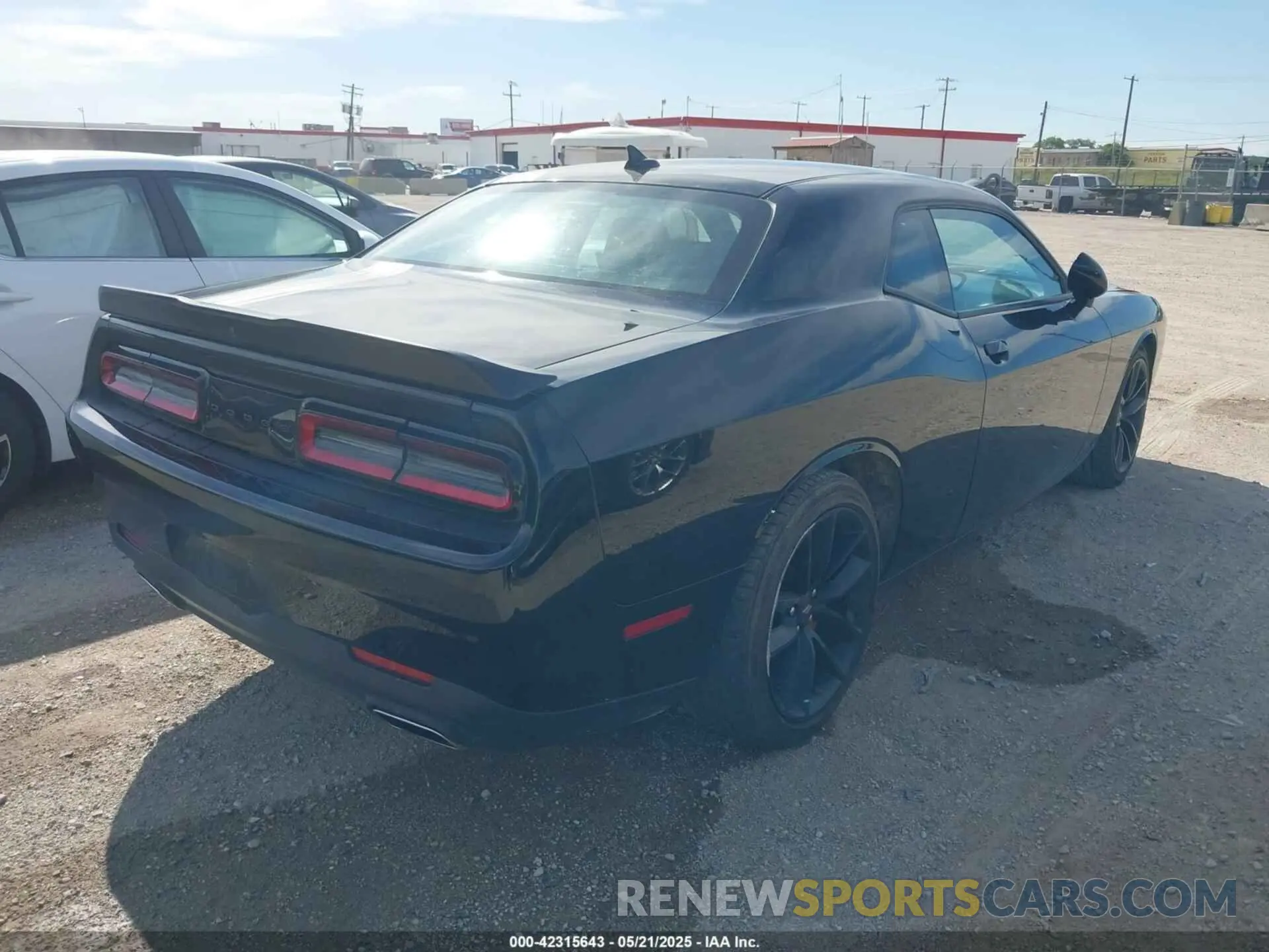 4 Photograph of a damaged car 2C3CDZJGXNH242352 DODGE CHALLENGER 2022