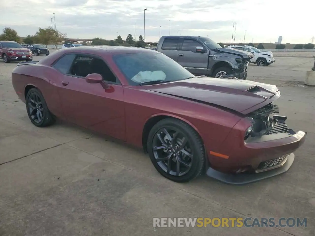 4 Photograph of a damaged car 2C3CDZBTXPH668783 DODGE CHALLENGER 2023
