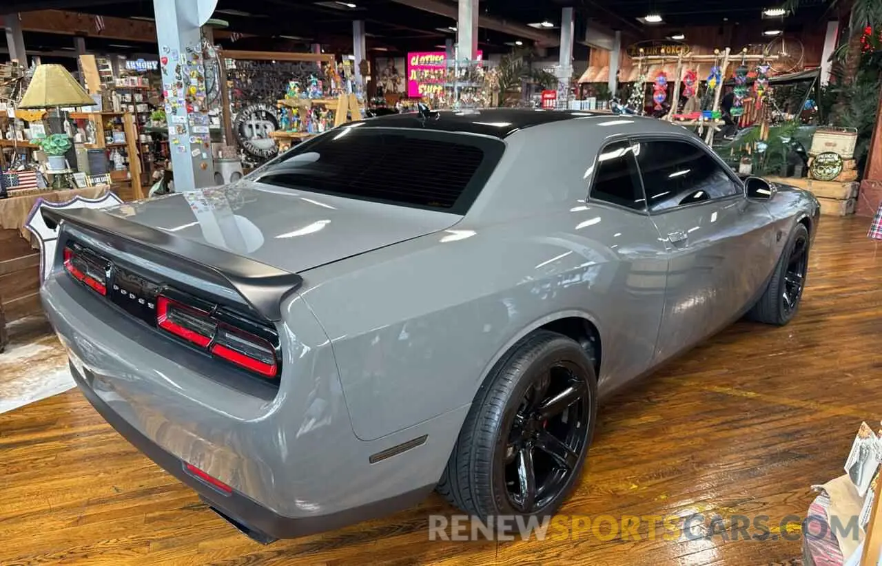4 Photograph of a damaged car 2C3CDZC92PH601551 DODGE CHALLENGER 2023