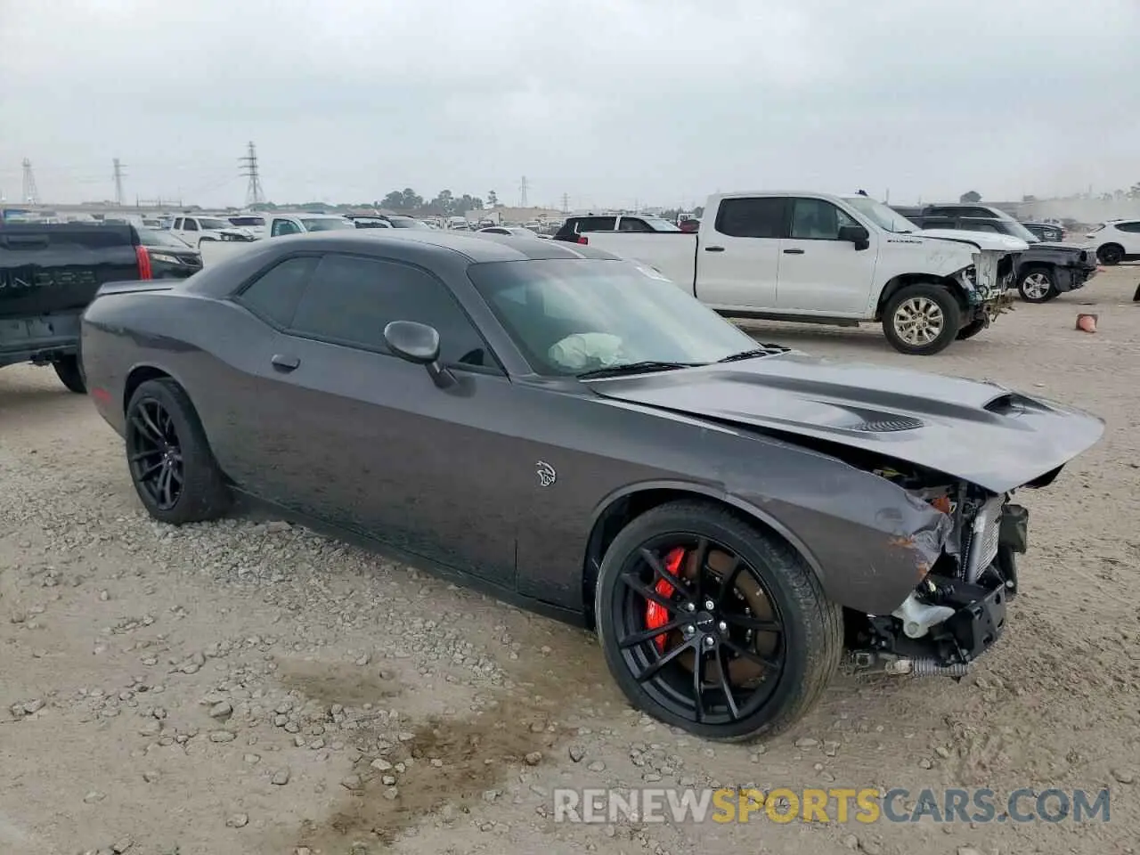 4 Photograph of a damaged car 2C3CDZC97PH567512 DODGE CHALLENGER 2023