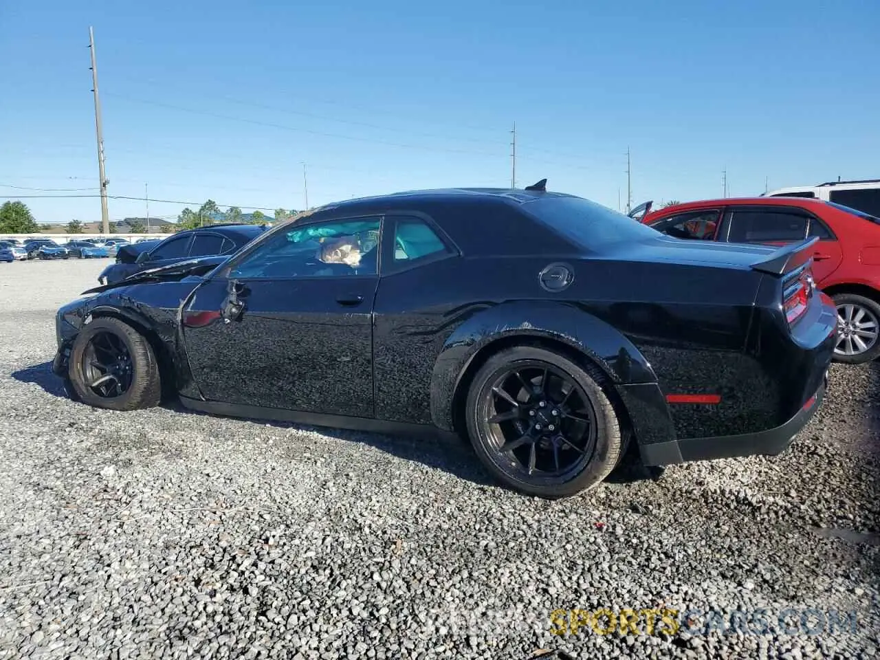 2 Photograph of a damaged car 2C3CDZC99PH520434 DODGE CHALLENGER 2023