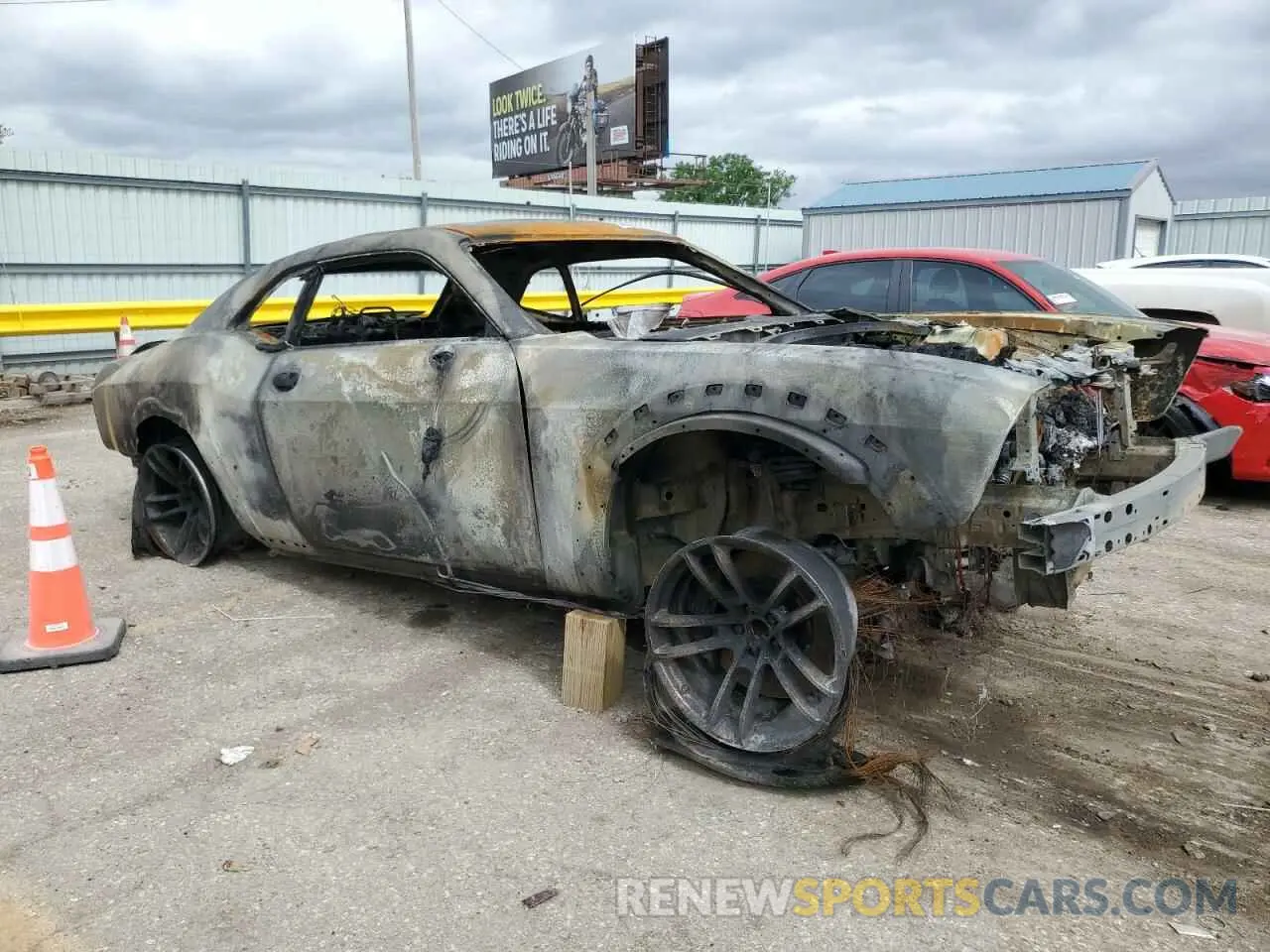 4 Photograph of a damaged car 2C3CDZFJ2PH617741 DODGE CHALLENGER 2023