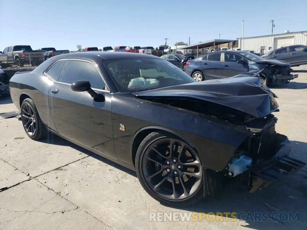 4 Photograph of a damaged car 2C3CDZFJ5PH618205 DODGE CHALLENGER 2023