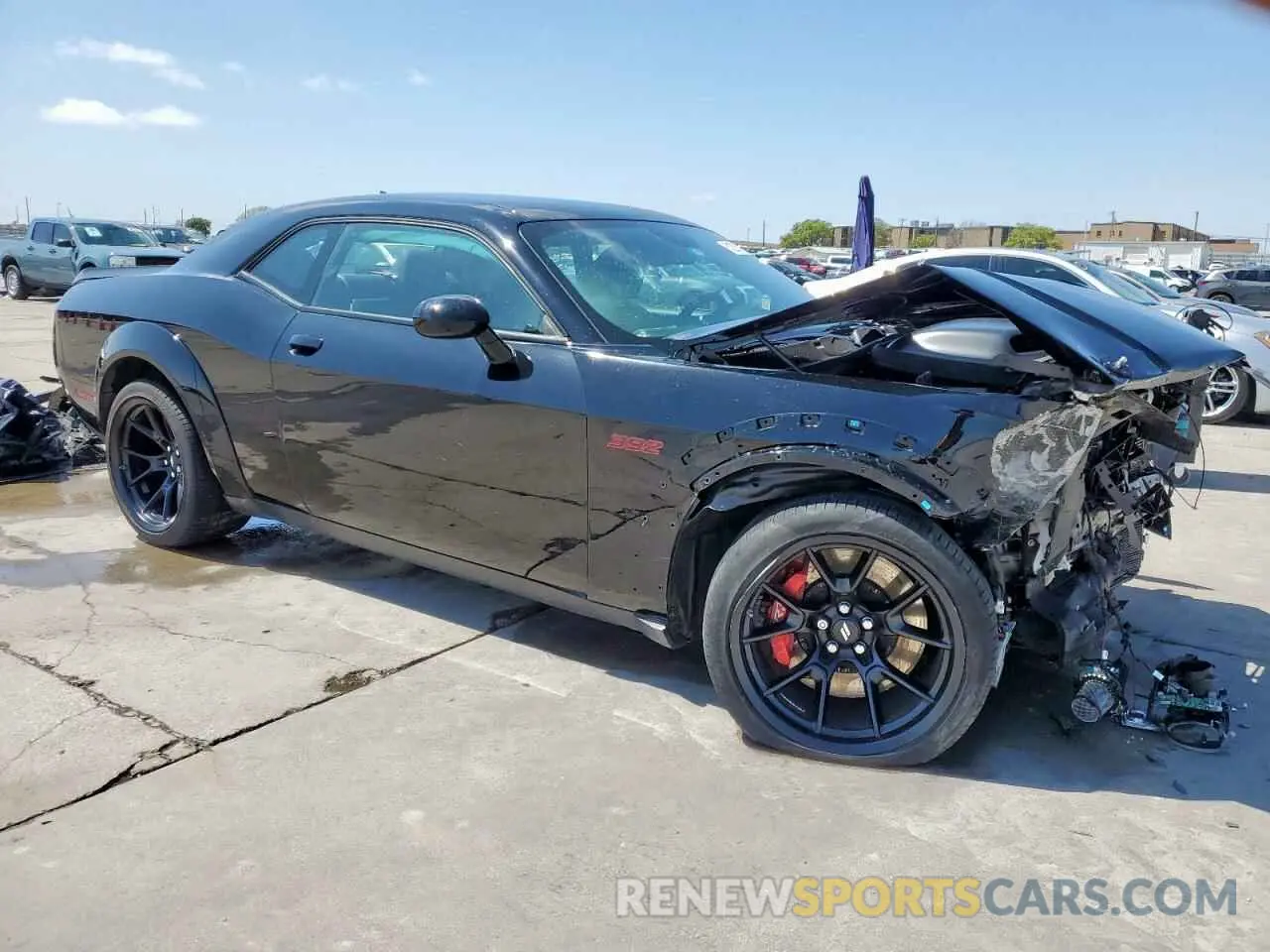4 Photograph of a damaged car 2C3CDZFJ9PH601715 DODGE CHALLENGER 2023