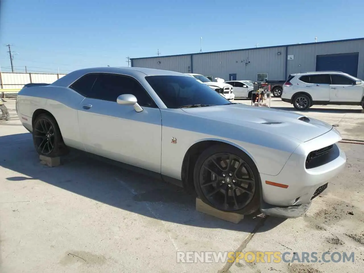 4 Photograph of a damaged car 2C3CDZFJXPH574993 DODGE CHALLENGER 2023