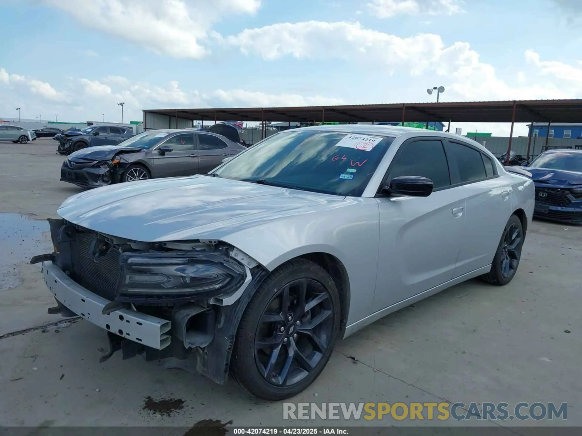 2 Photograph of a damaged car 2C3CDXBG1KH615387 DODGE CHARGER 2019
