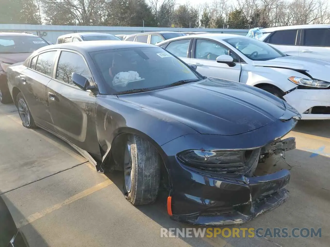 4 Photograph of a damaged car 2C3CDXBG6KH674709 DODGE CHARGER 2019