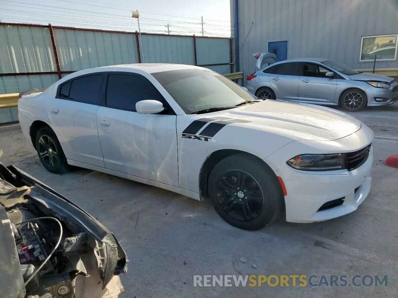 4 Photograph of a damaged car 2C3CDXBG6KH696256 DODGE CHARGER 2019