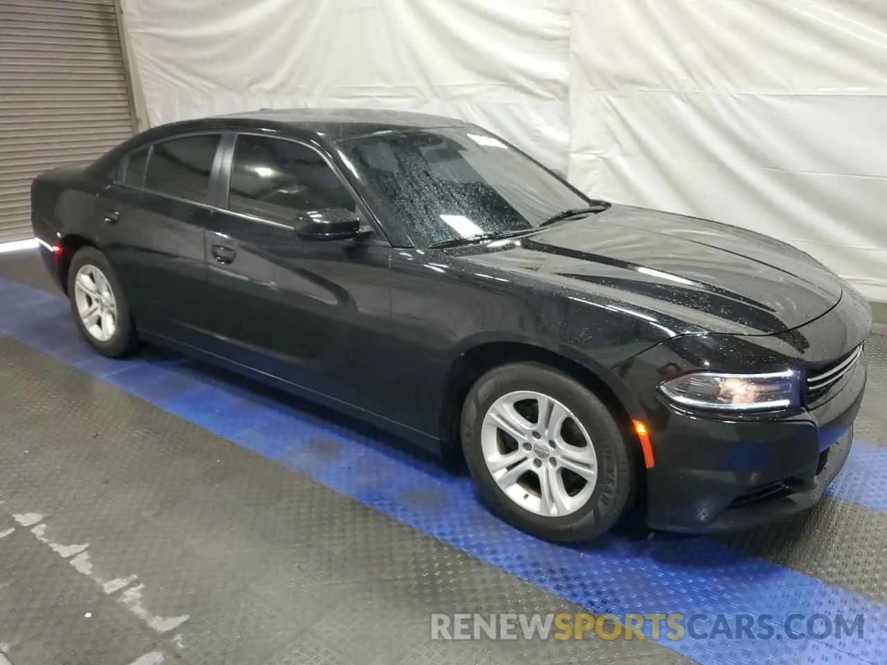 4 Photograph of a damaged car 2C3CDXBG7KH657997 DODGE CHARGER 2019