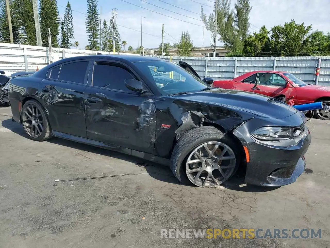 4 Photograph of a damaged car 2C3CDXGJ0KH564131 DODGE CHARGER 2019