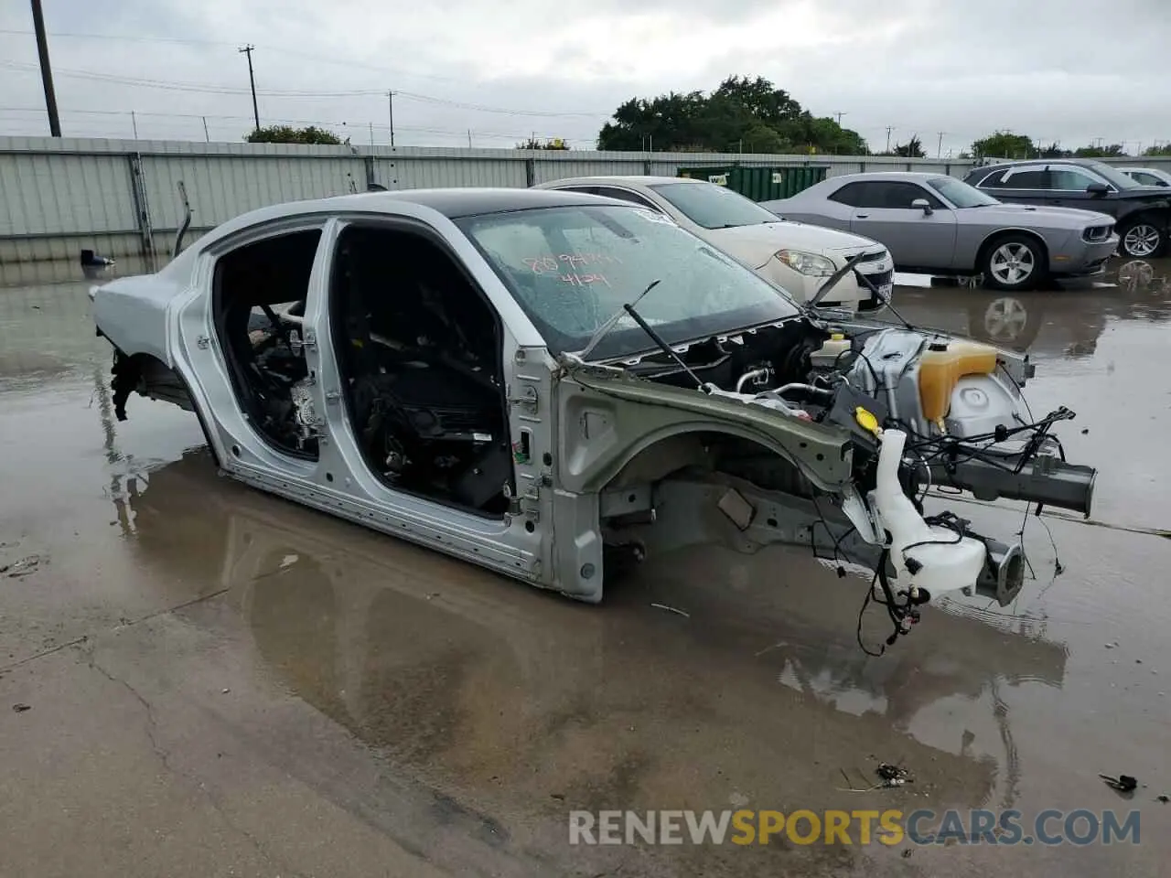 4 Photograph of a damaged car 2C3CDXGJ4KH562379 DODGE CHARGER 2019