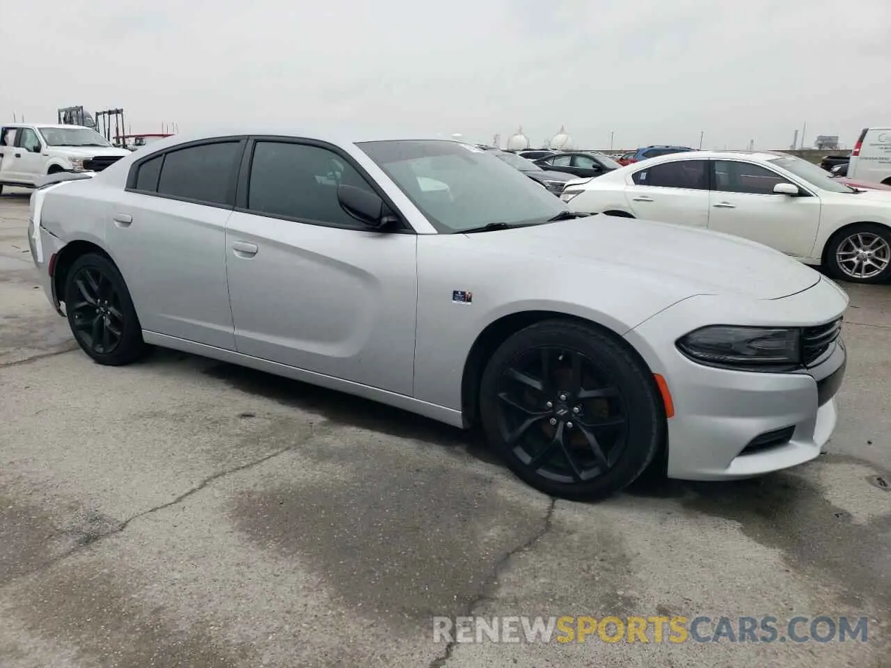 4 Photograph of a damaged car 2C3CDXBG9LH176716 DODGE CHARGER 2020
