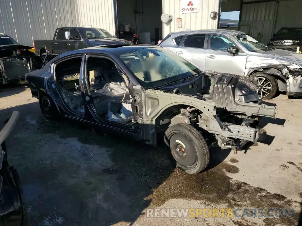 4 Photograph of a damaged car 2C3CDXGJ2LH221533 DODGE CHARGER 2020