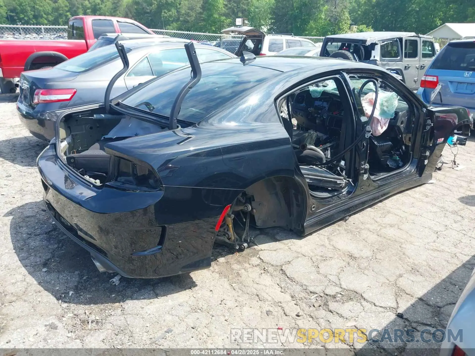 4 Photograph of a damaged car 2C3CDXGJ4LH193380 DODGE CHARGER 2020