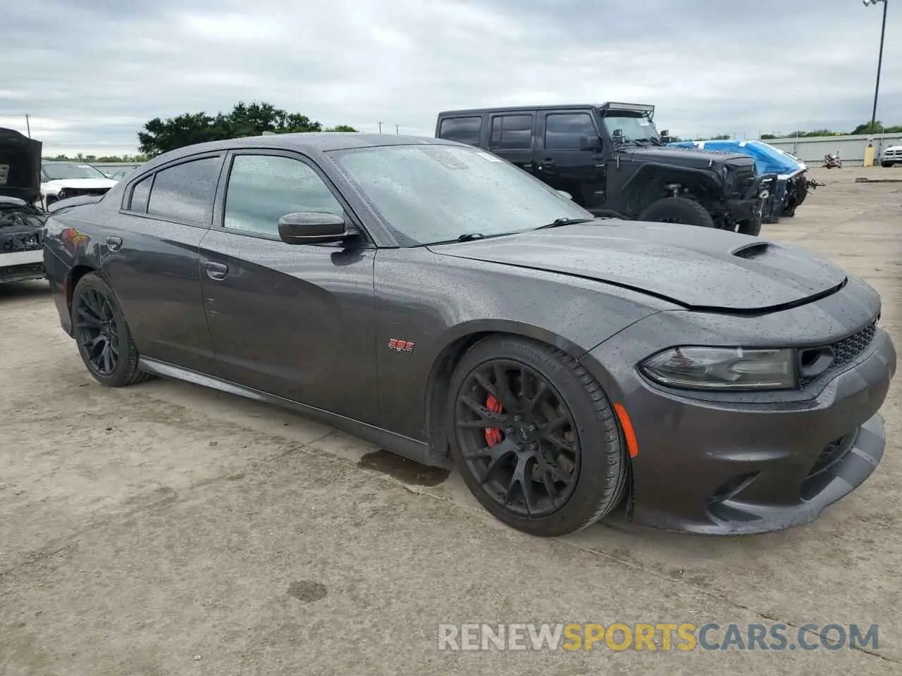 4 Photograph of a damaged car 2C3CDXGJ8LH252320 DODGE CHARGER 2020