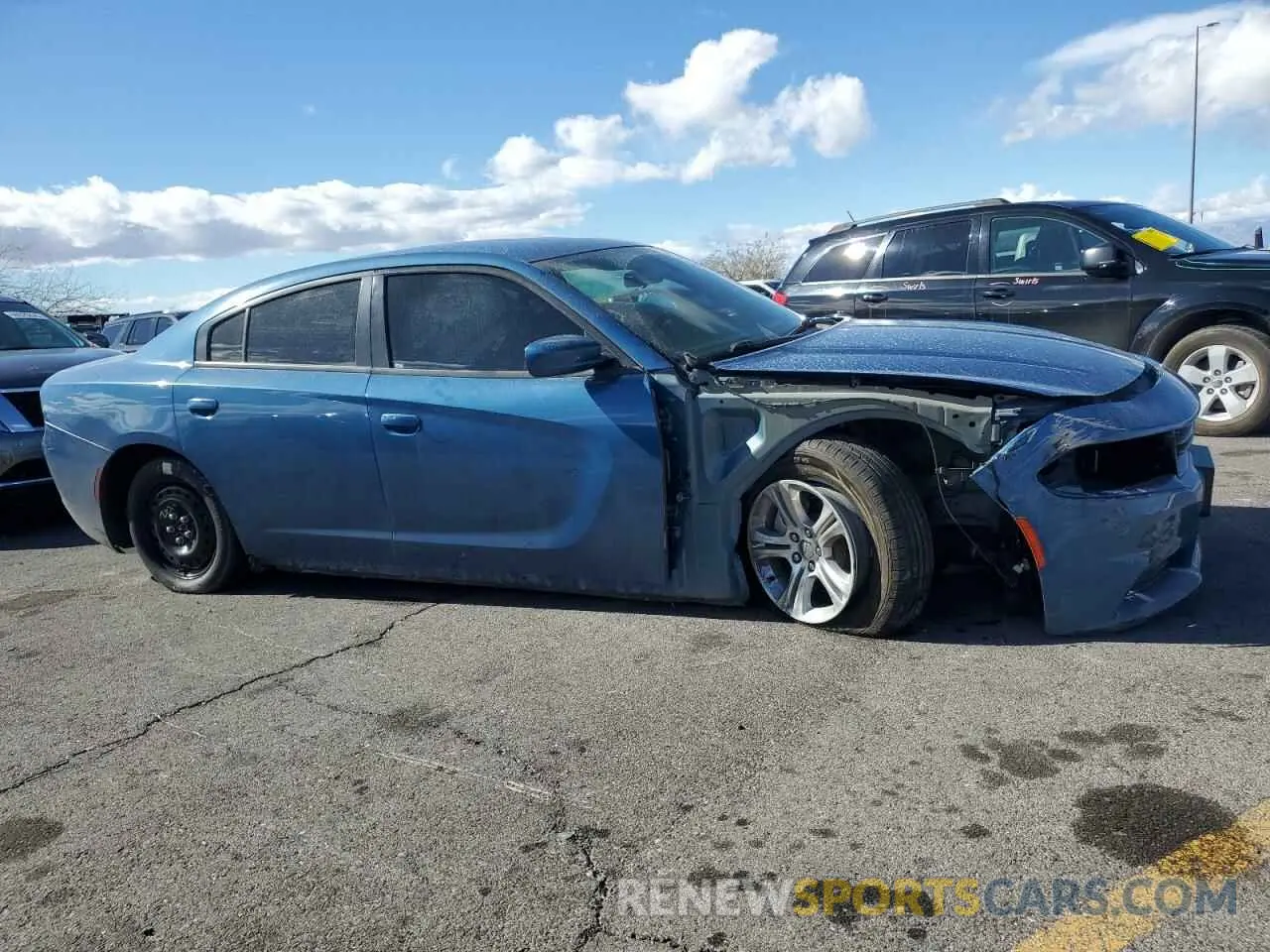 4 Photograph of a damaged car 2C3CDXBG2MH632654 DODGE CHARGER 2021