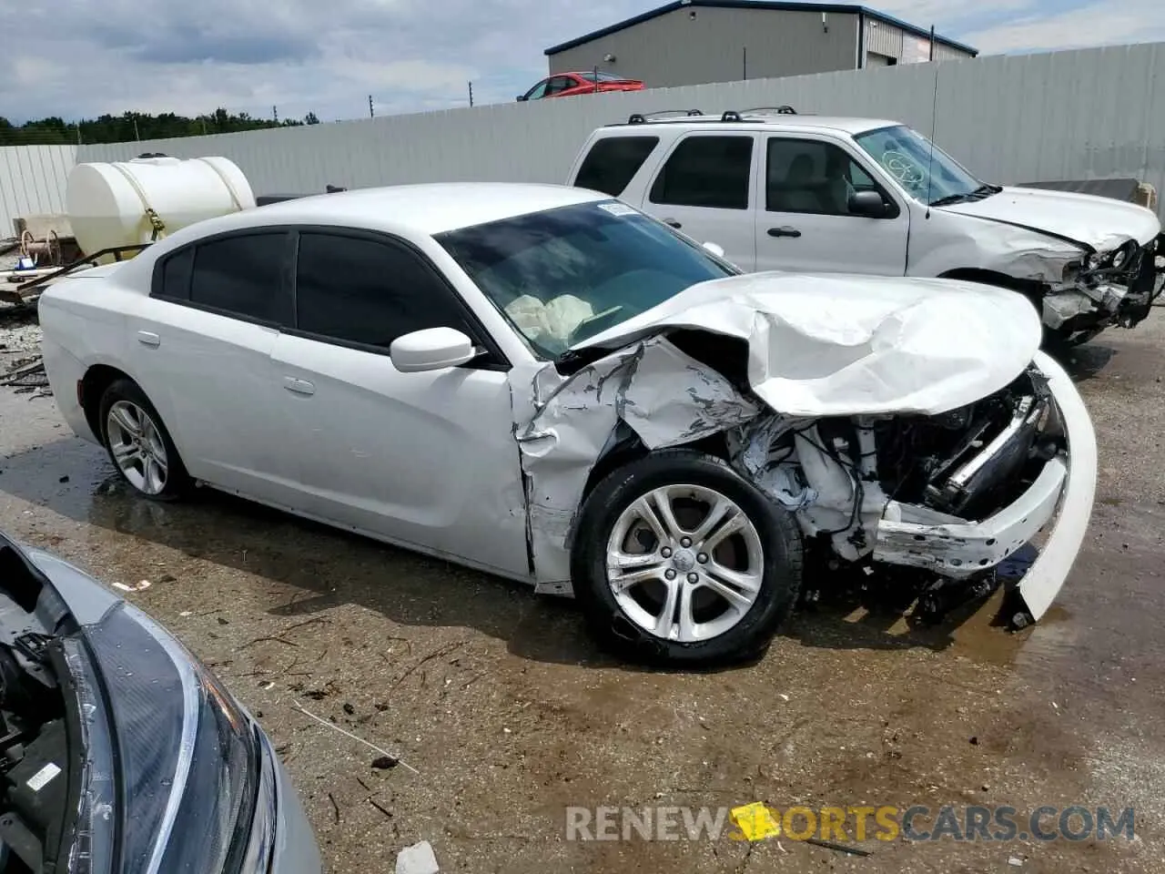 4 Photograph of a damaged car 2C3CDXBG4MH590052 DODGE CHARGER 2021