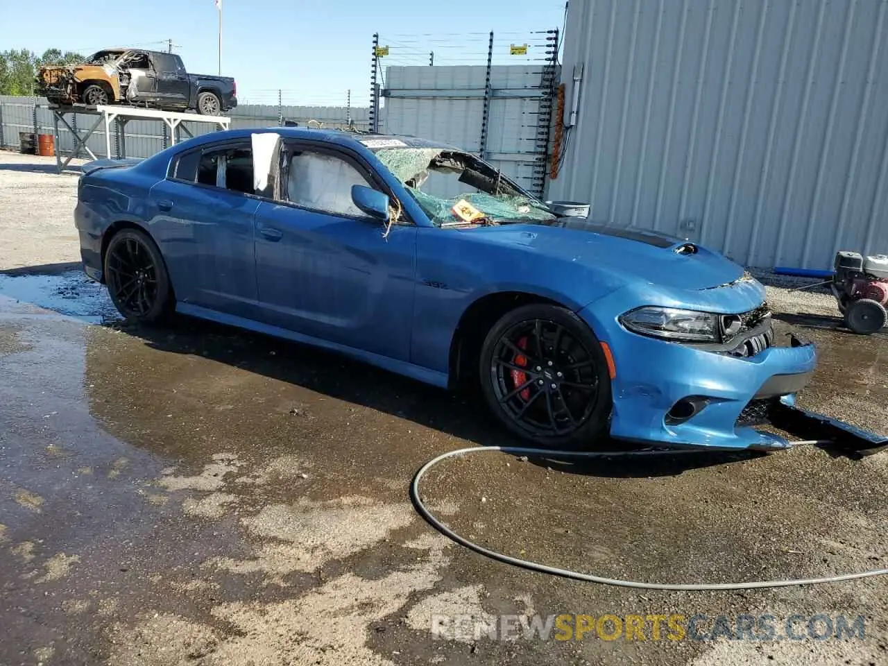 4 Photograph of a damaged car 2C3CDXGJ1MH565193 DODGE CHARGER 2021