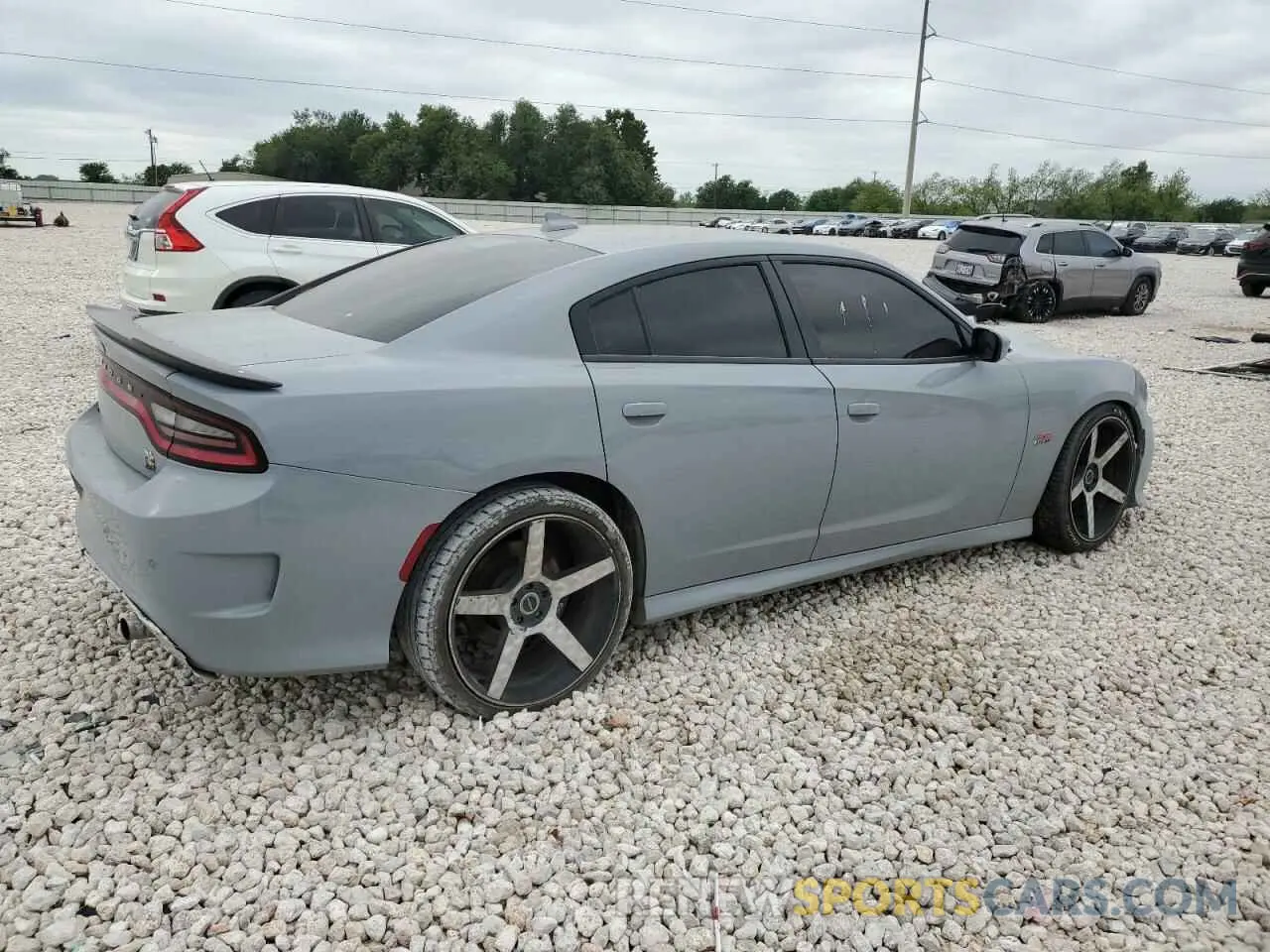 3 Photograph of a damaged car 2C3CDXGJ4MH614578 DODGE CHARGER 2021