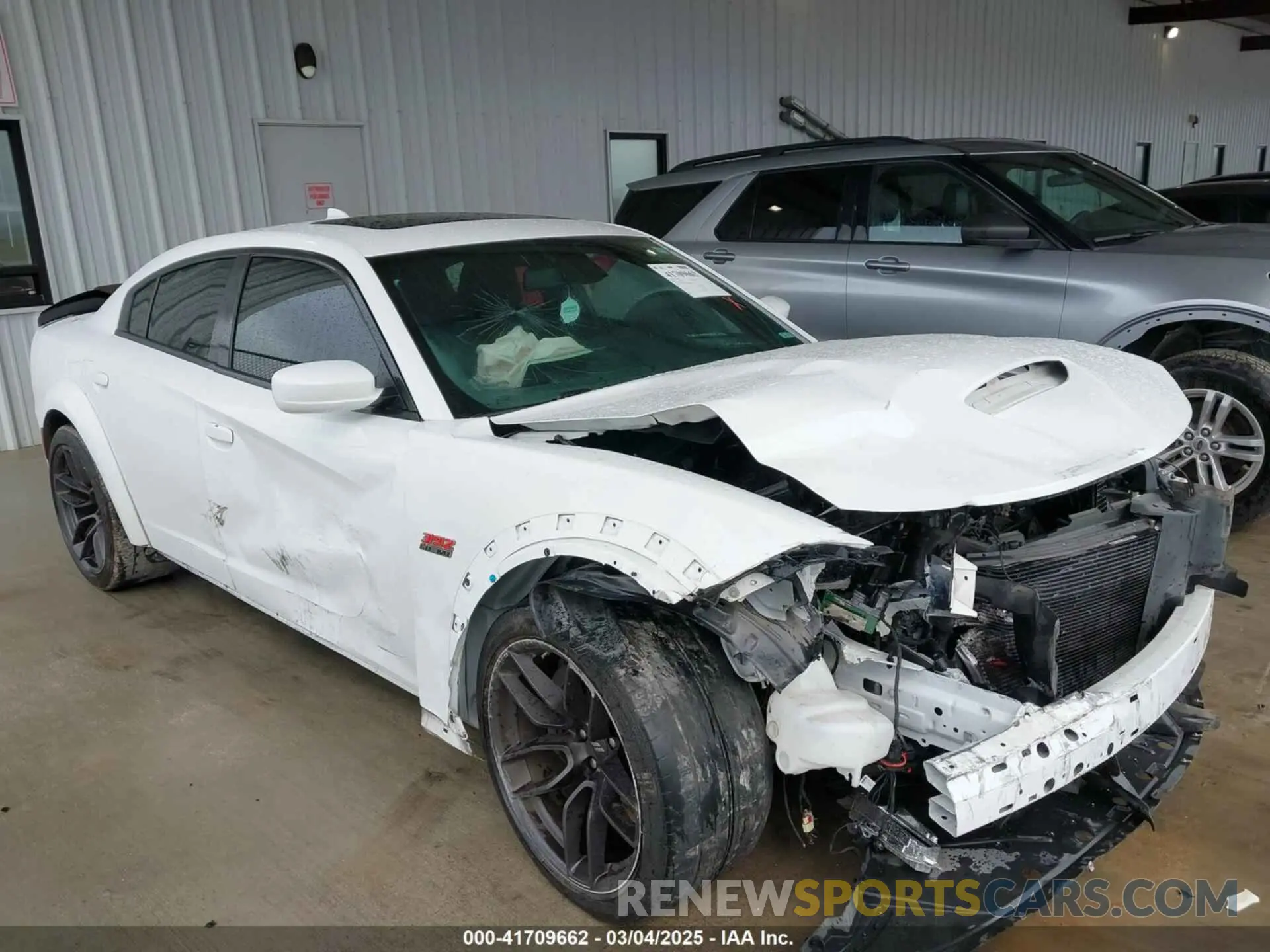 12 Photograph of a damaged car 2C3CDXGJ7MH579874 DODGE CHARGER 2021