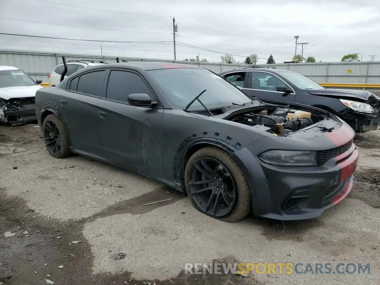 4 Photograph of a damaged car 2C3CDXGJXMH503873 DODGE CHARGER 2021