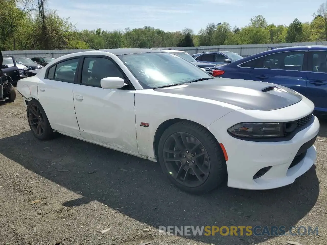 4 Photograph of a damaged car 2C3CDXGJXMH511648 DODGE CHARGER 2021