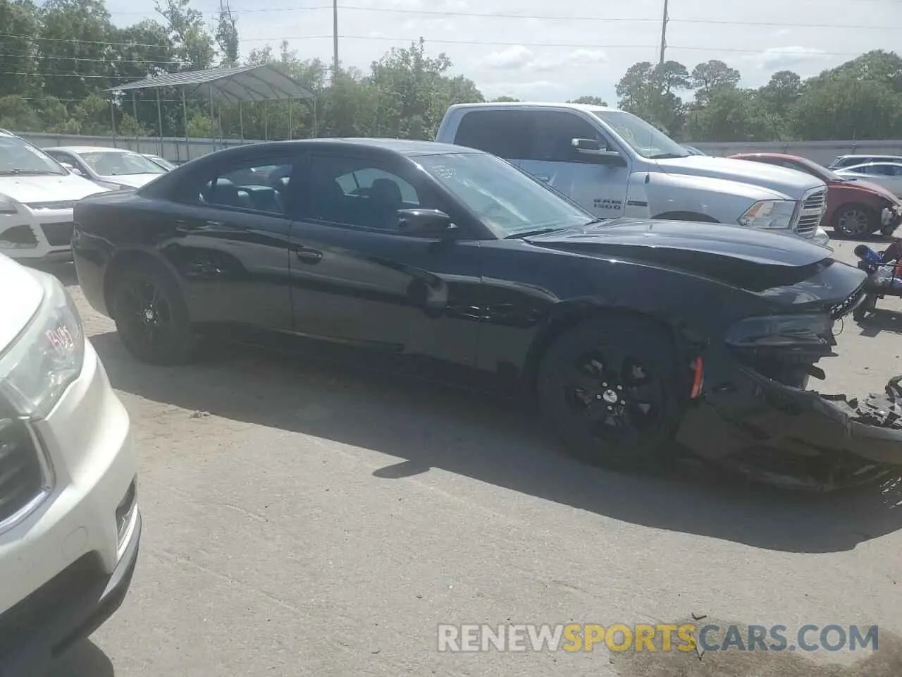 4 Photograph of a damaged car 2C3CDXBG1NH138108 DODGE CHARGER 2022