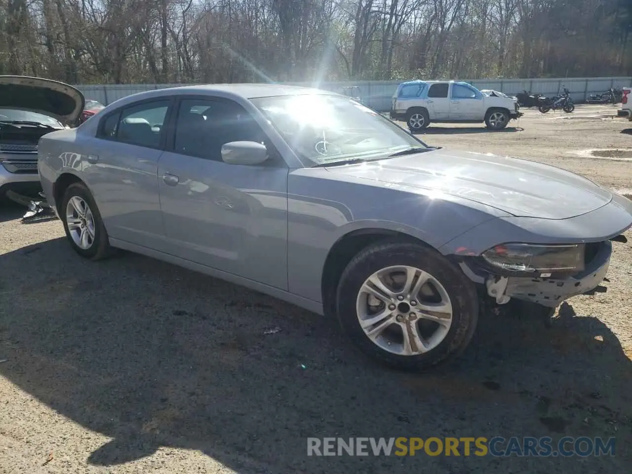 4 Photograph of a damaged car 2C3CDXBG1NH169326 DODGE CHARGER 2022