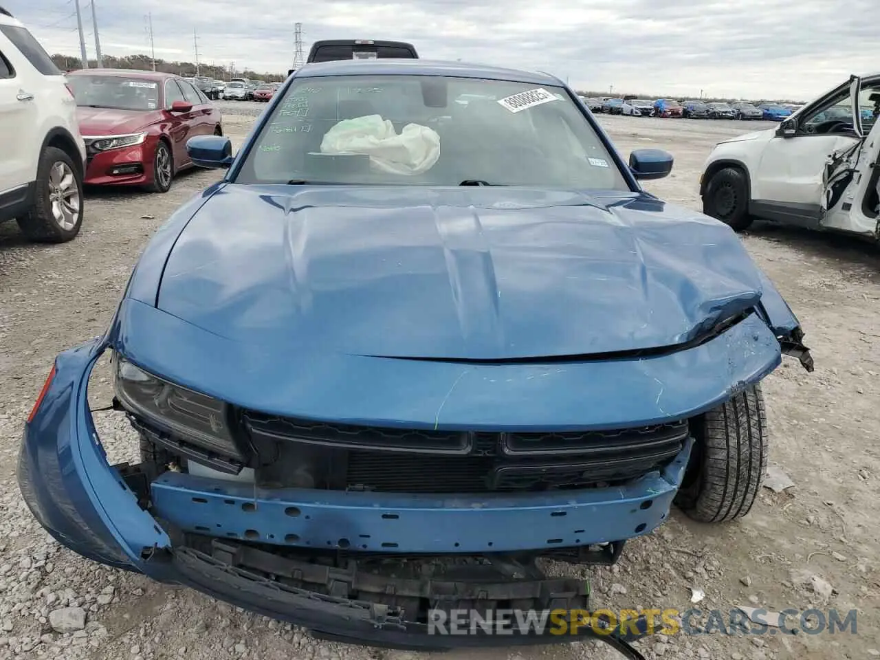 5 Photograph of a damaged car 2C3CDXBG1NH255476 DODGE CHARGER 2022