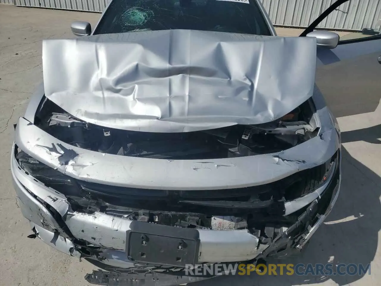 11 Photograph of a damaged car 2C3CDXBG2NH129398 DODGE CHARGER 2022