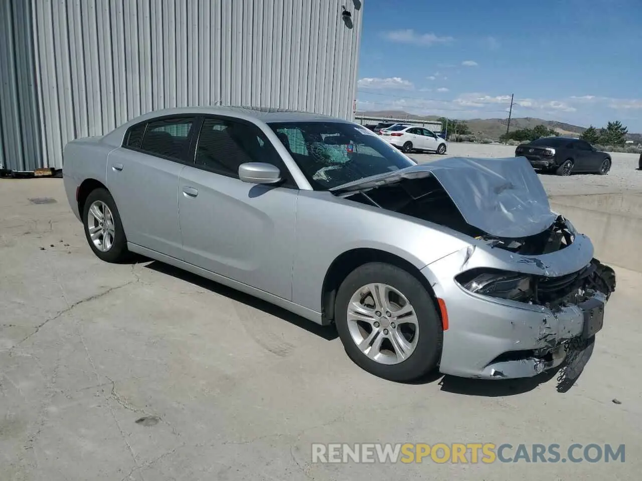 4 Photograph of a damaged car 2C3CDXBG2NH129398 DODGE CHARGER 2022