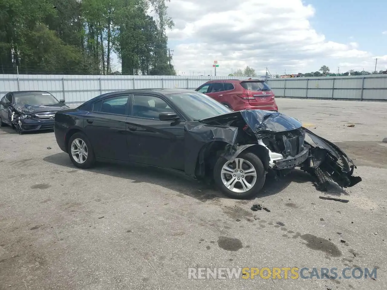 4 Photograph of a damaged car 2C3CDXBG2NH200616 DODGE CHARGER 2022