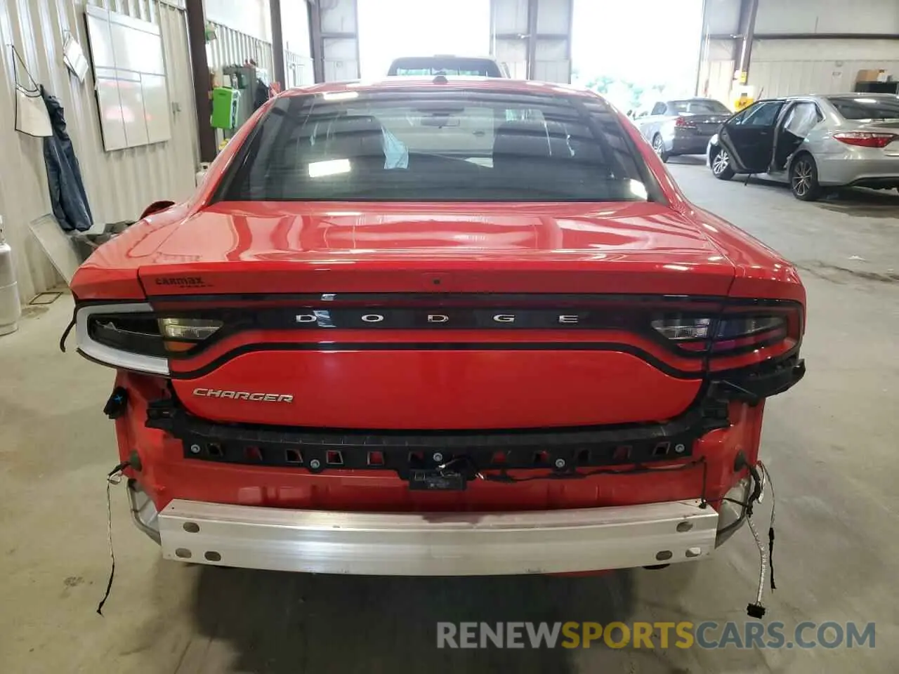 6 Photograph of a damaged car 2C3CDXBG3NH234693 DODGE CHARGER 2022