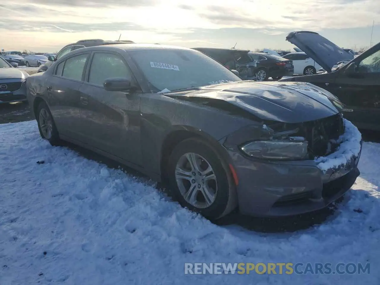 4 Photograph of a damaged car 2C3CDXBG5NH217183 DODGE CHARGER 2022