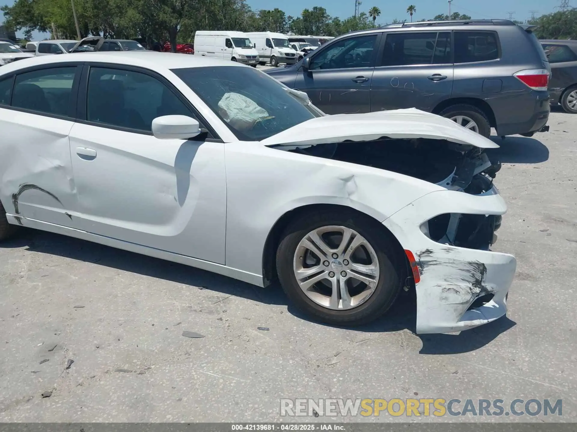 19 Photograph of a damaged car 2C3CDXBG5NH224506 DODGE CHARGER 2022
