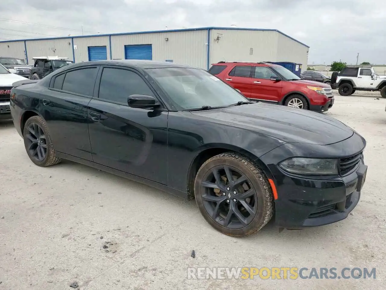 4 Photograph of a damaged car 2C3CDXBG8NH153589 DODGE CHARGER 2022