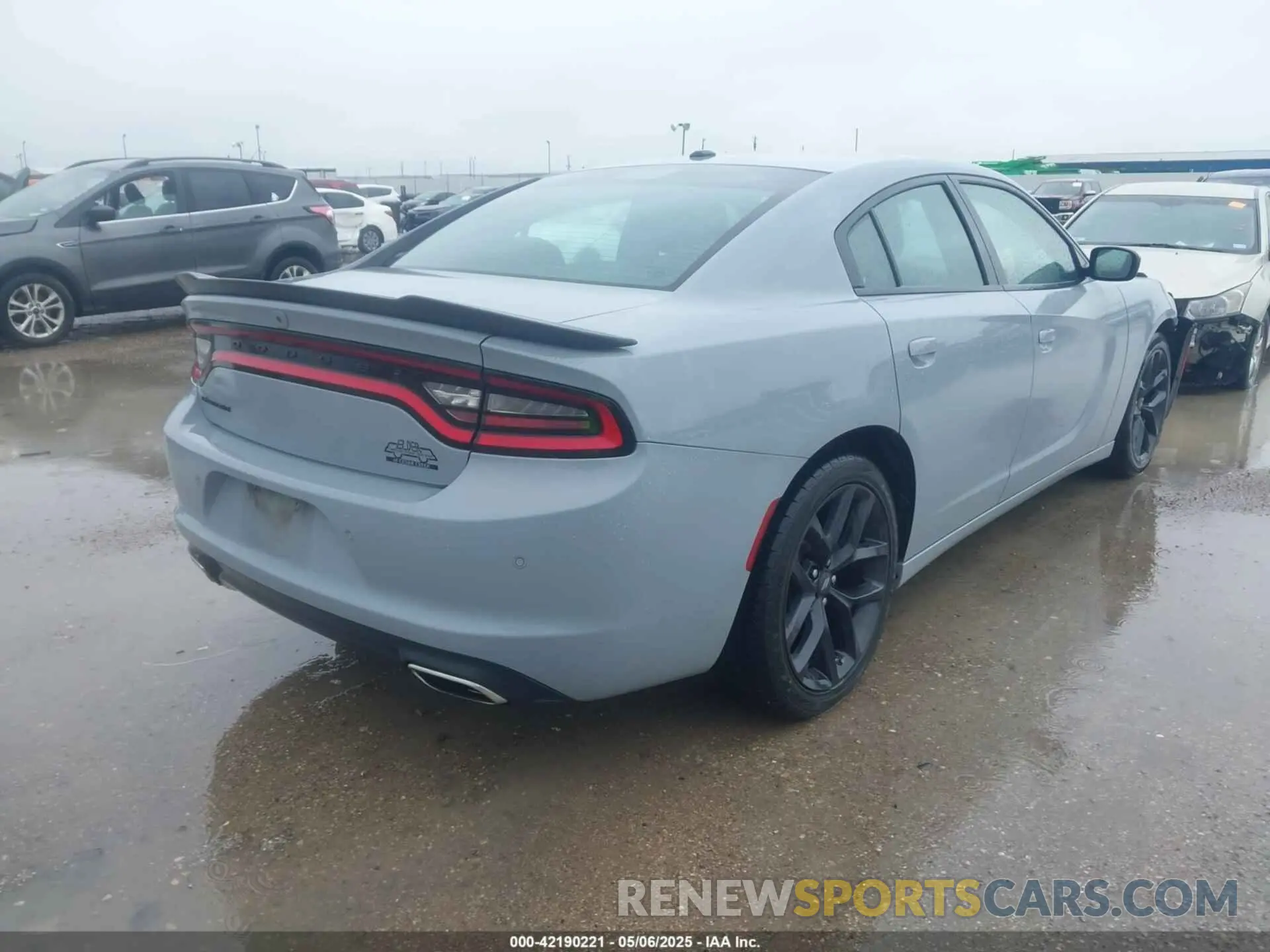 4 Photograph of a damaged car 2C3CDXBGXNH161743 DODGE CHARGER 2022