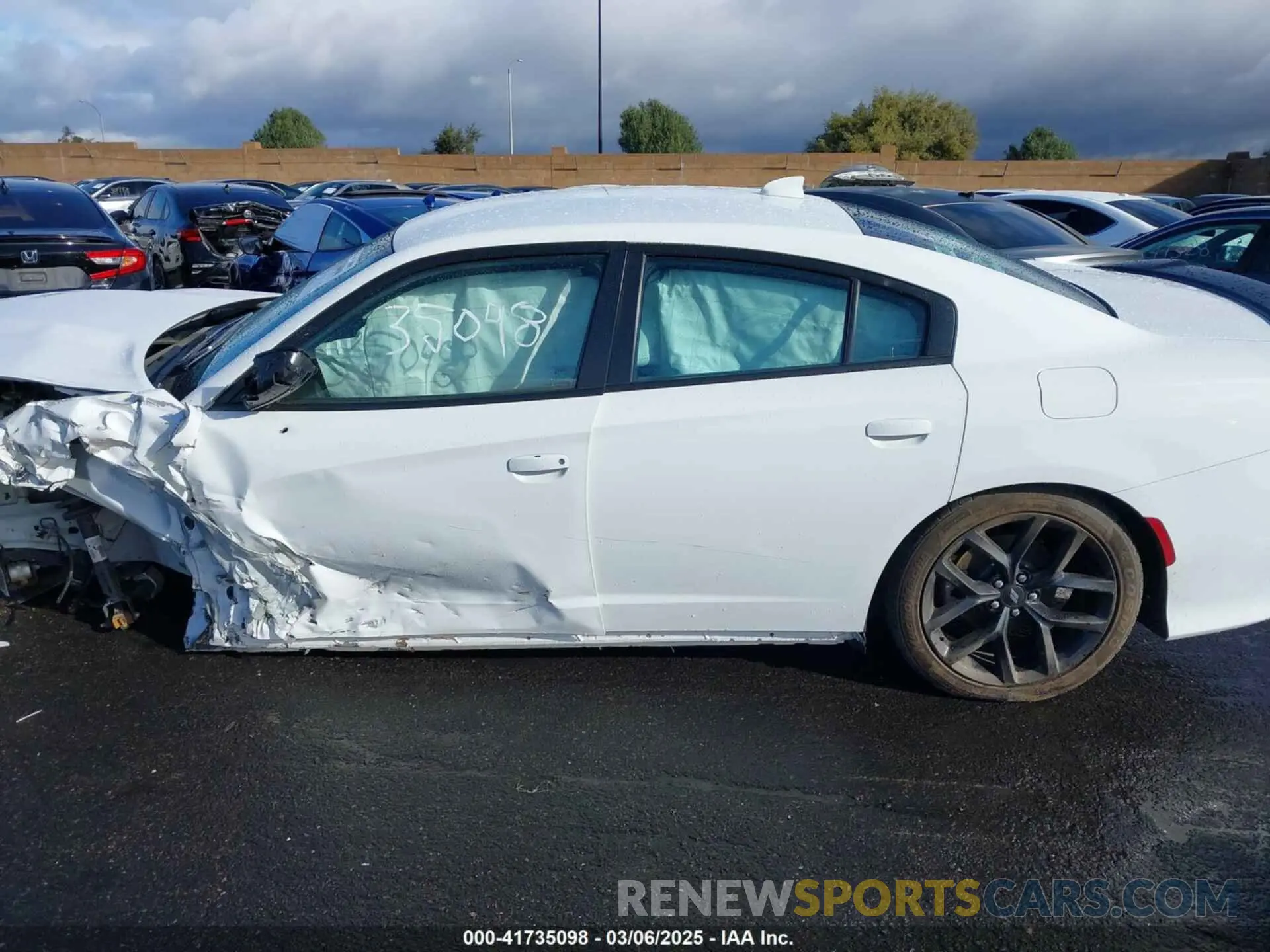 14 Photograph of a damaged car 2C3CDXCT4NH202170 DODGE CHARGER 2022