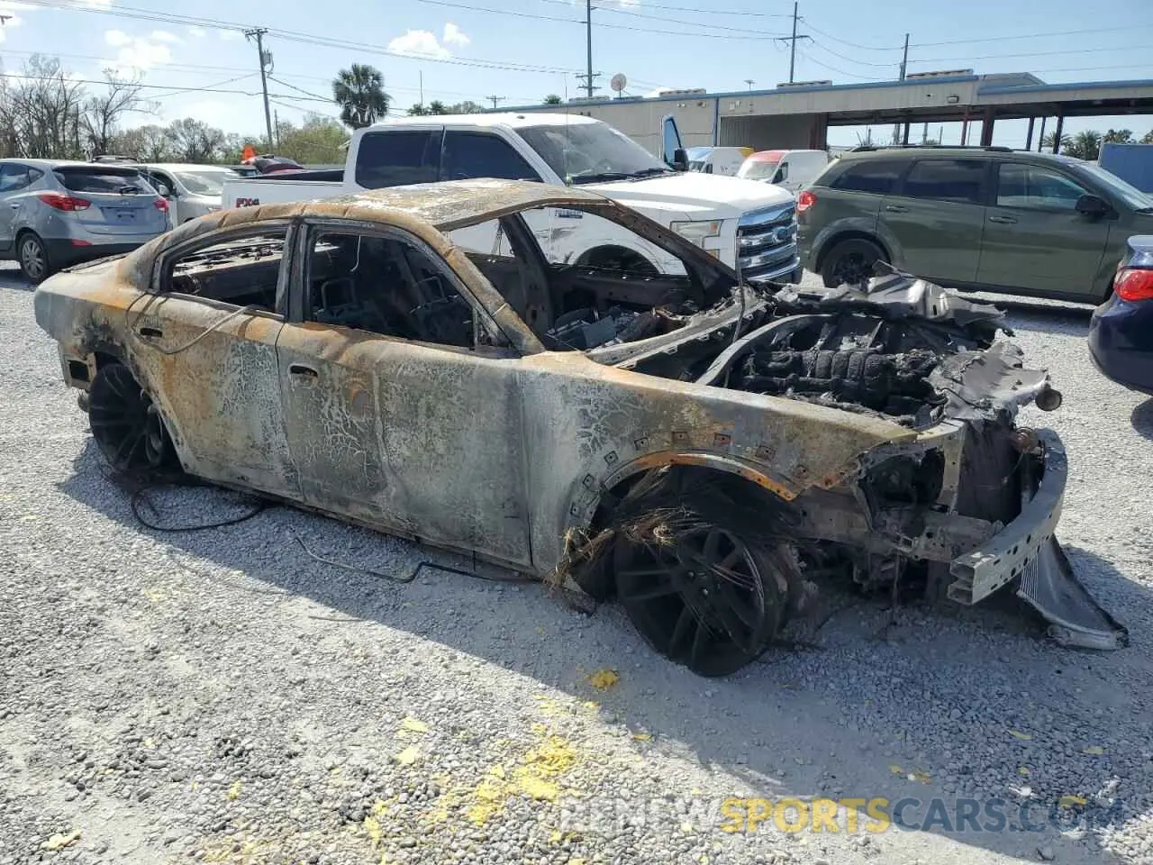 4 Photograph of a damaged car 2C3CDXGJ0NH210999 DODGE CHARGER 2022