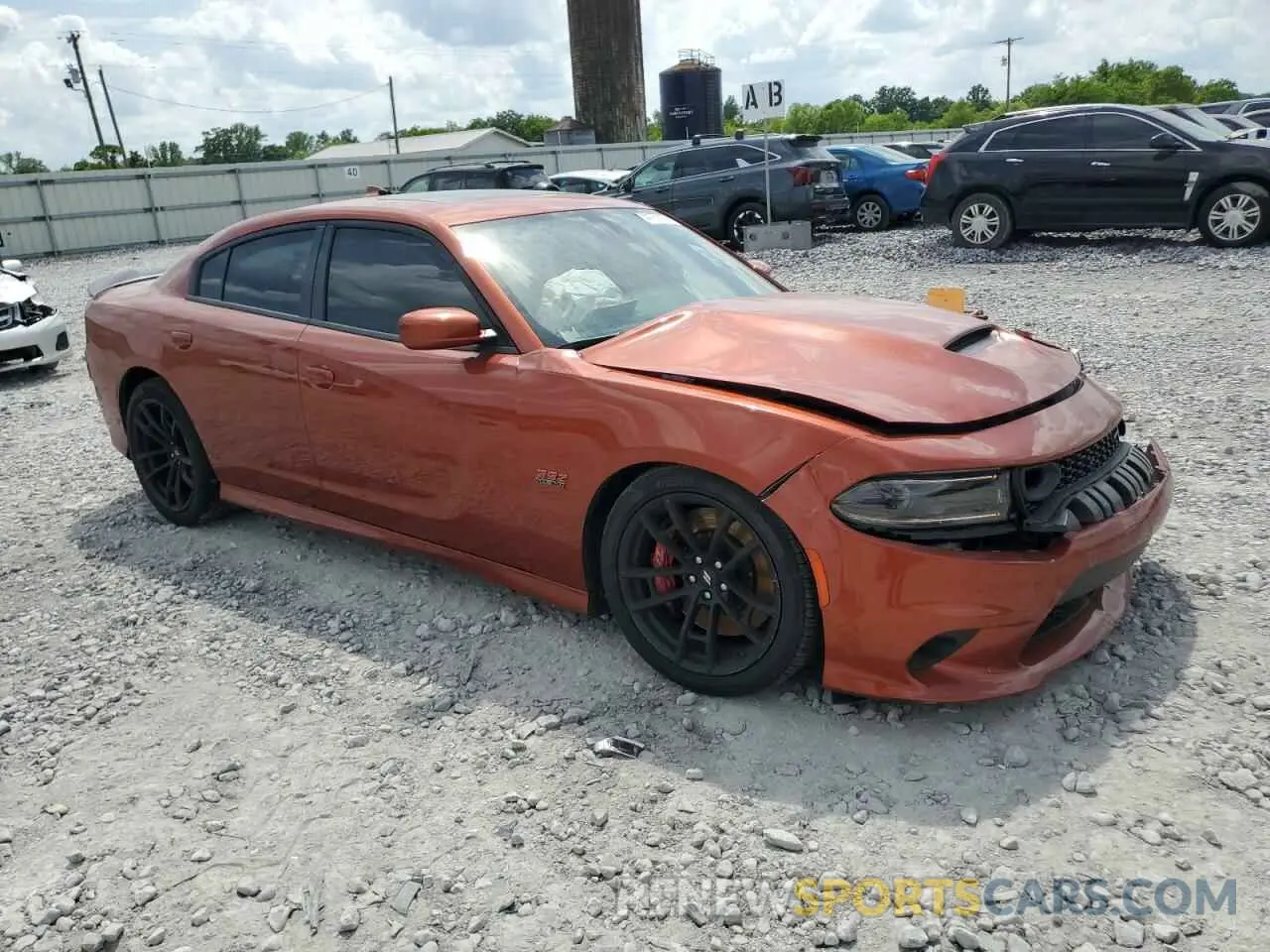 4 Photograph of a damaged car 2C3CDXGJ5NH123048 DODGE CHARGER 2022