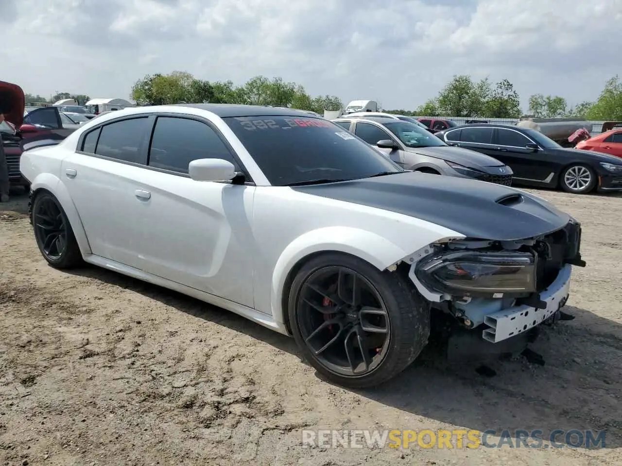 4 Photograph of a damaged car 2C3CDXGJ5NH136527 DODGE CHARGER 2022