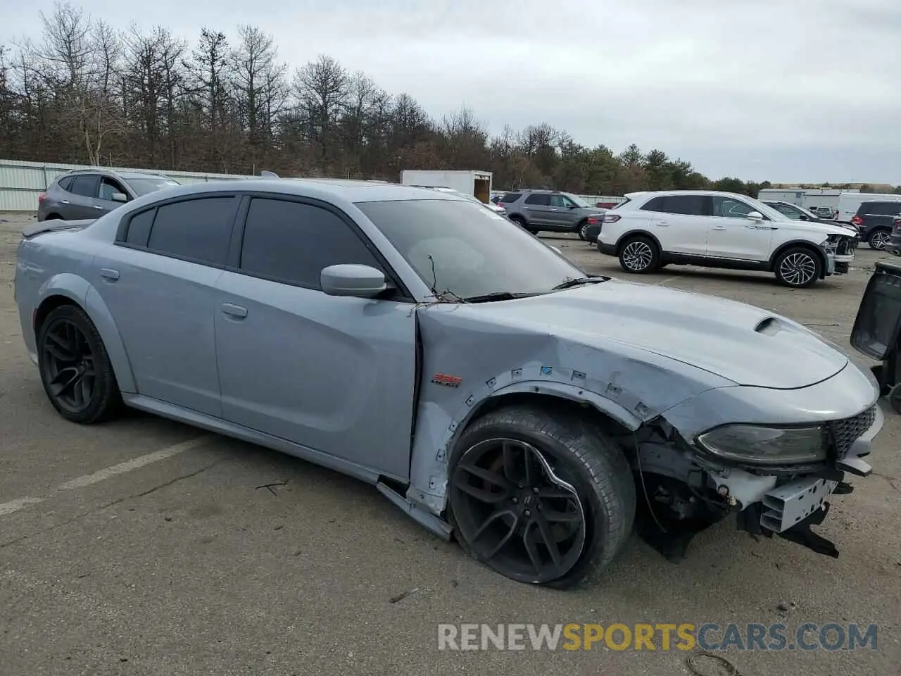 4 Photograph of a damaged car 2C3CDXGJ8NH101710 DODGE CHARGER 2022