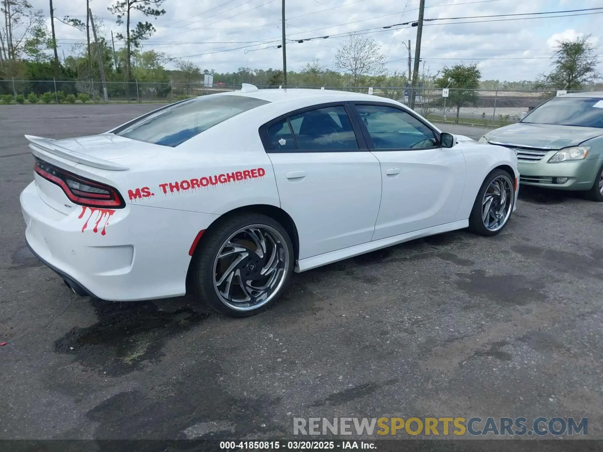 4 Photograph of a damaged car 2C3CDXHG8NH259757 DODGE CHARGER 2022