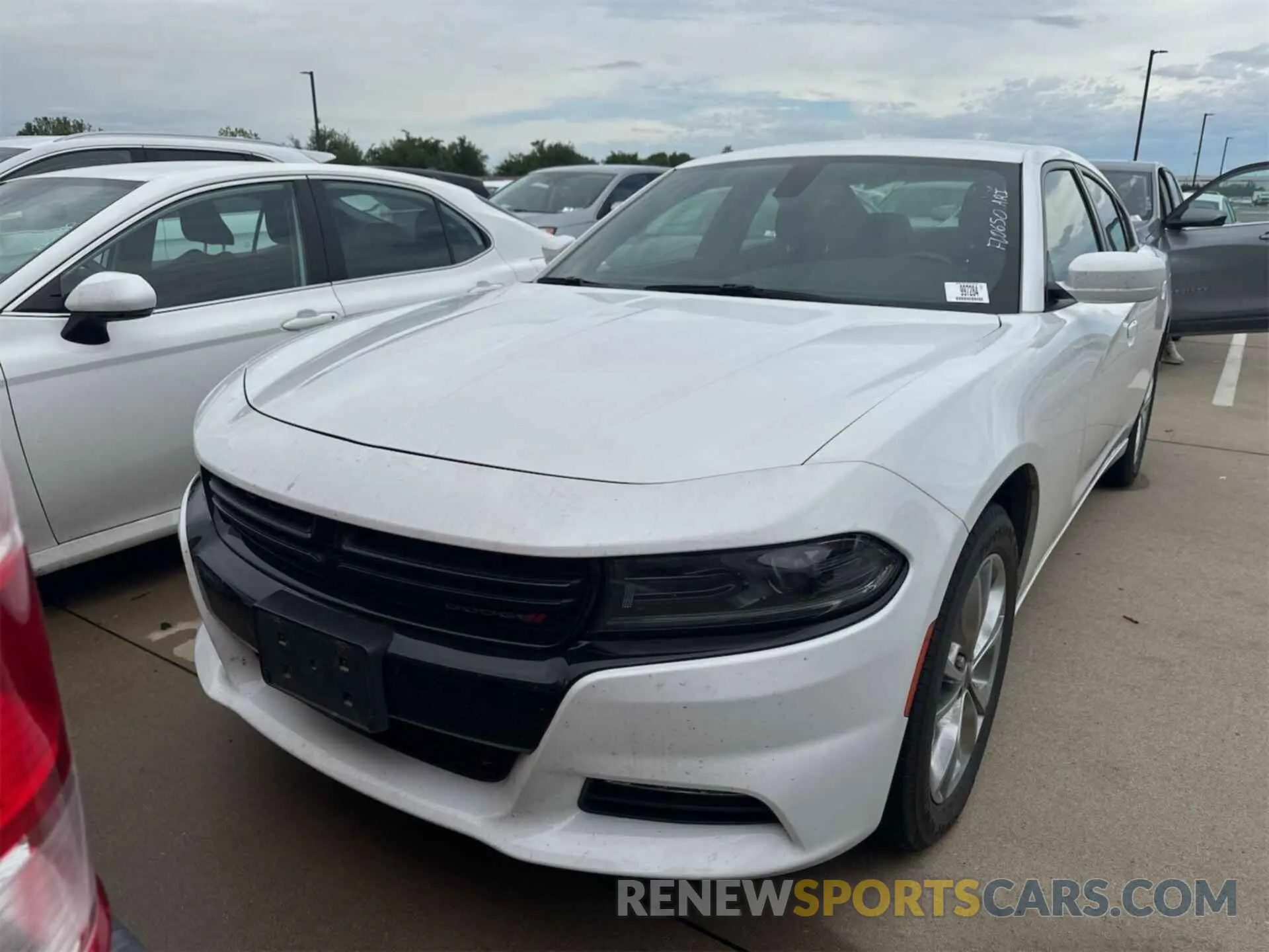 11 Photograph of a damaged car 2C3CDXJG2NH111209 DODGE CHARGER 2022