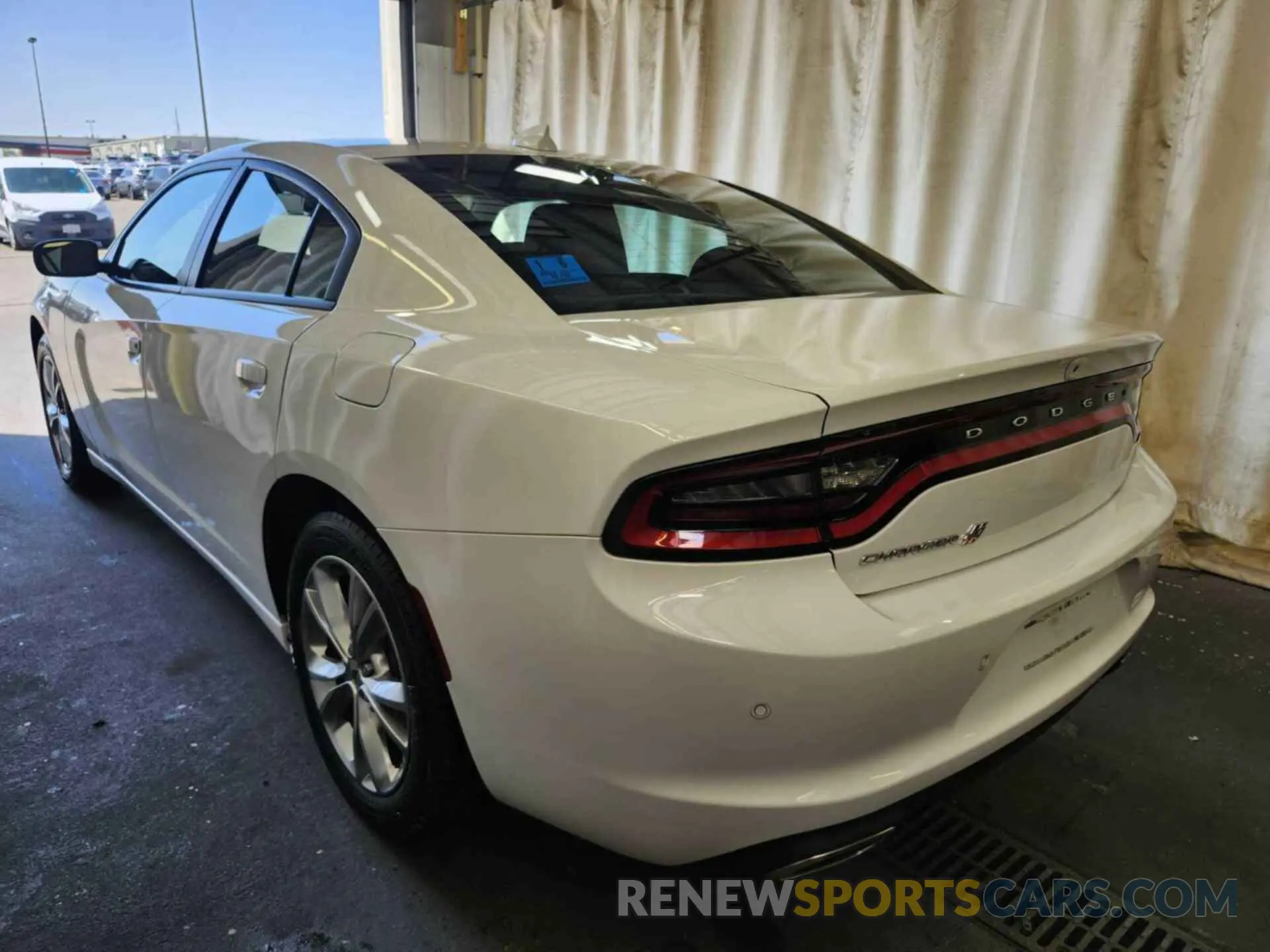 11 Photograph of a damaged car 2C3CDXJG9NH111207 DODGE CHARGER 2022