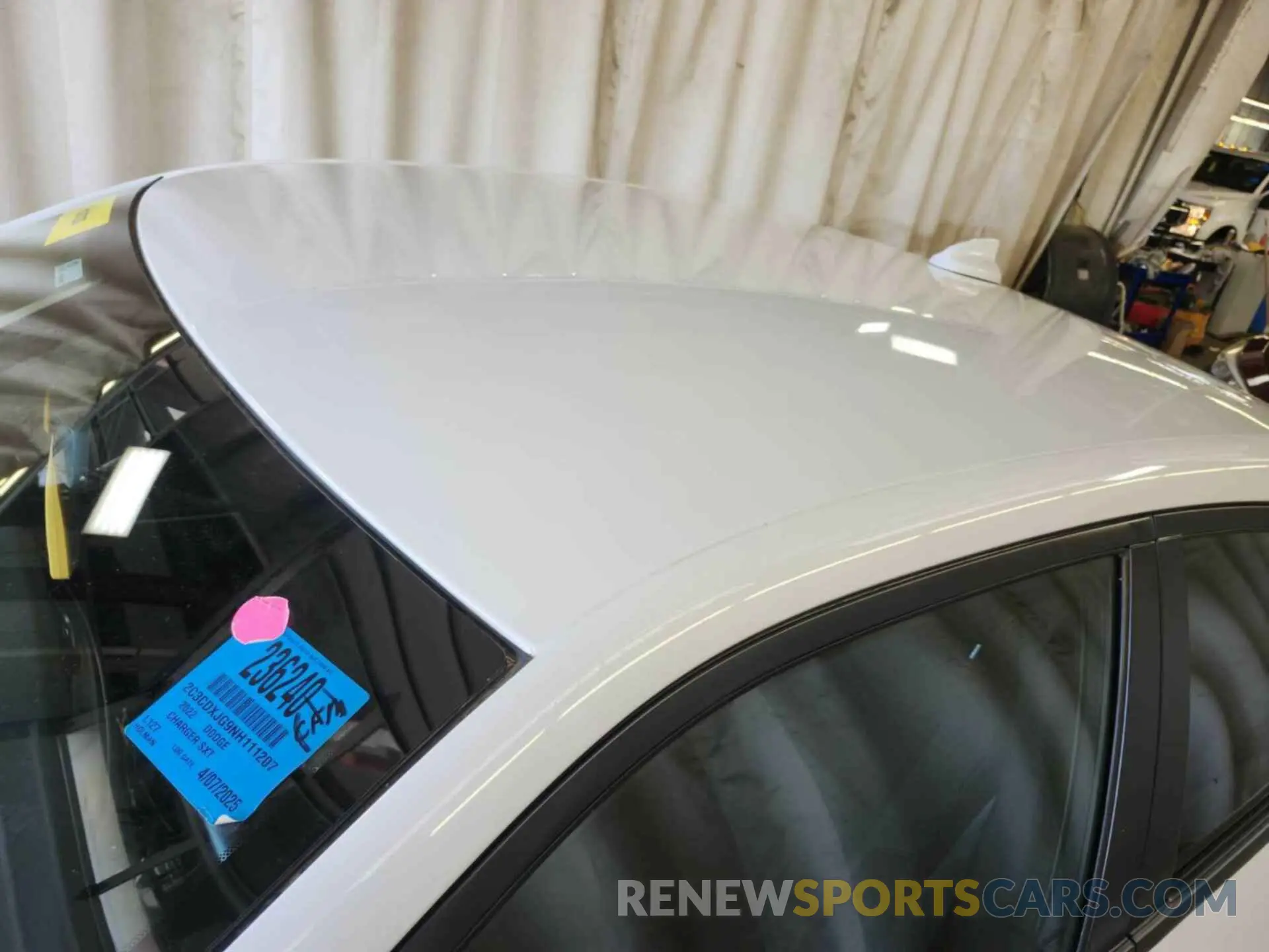 23 Photograph of a damaged car 2C3CDXJG9NH111207 DODGE CHARGER 2022