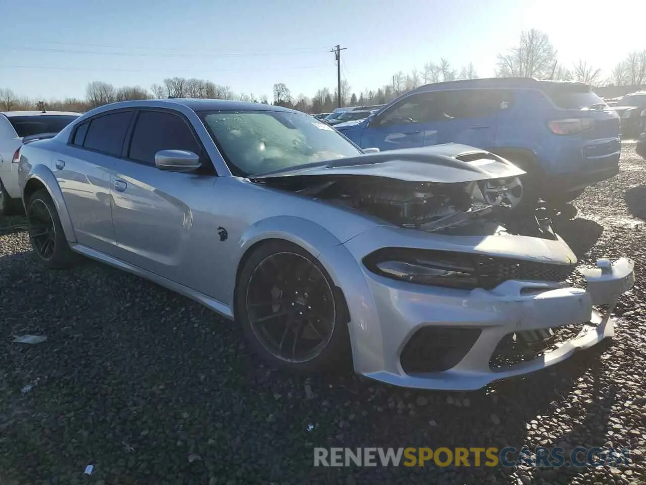 4 Photograph of a damaged car 2C3CDXL98NH159571 DODGE CHARGER 2022