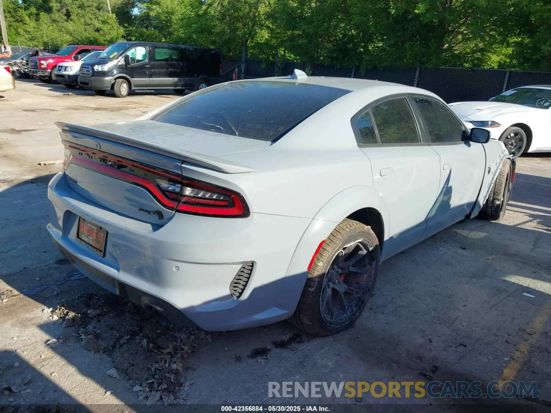 4 Photograph of a damaged car 2C3CDXL99NH124005 DODGE CHARGER 2022